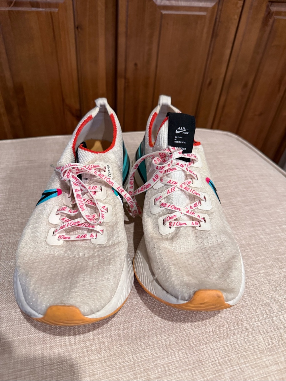 Nike Women's Cream Mesh Running Shoes with Teal and Pink Accents